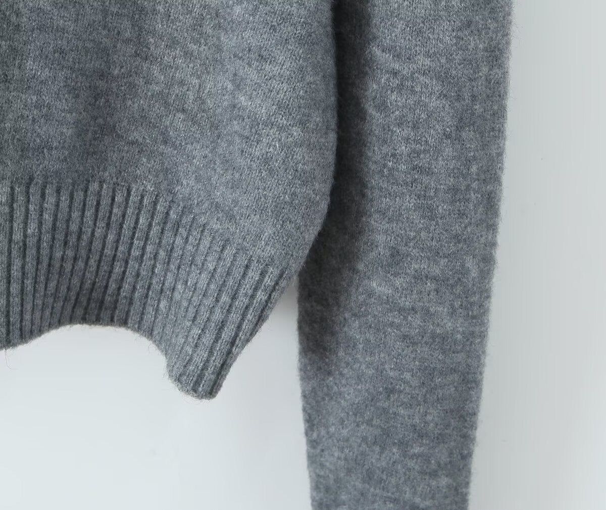 CARDIGAN MIT FELLKRAGEN